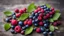 Placeholder: A summer picture with freshly picked forest berries (lingonberry, blueberry, raspberry)