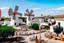 Placeholder: A white village with windmills painted by Keith Haring