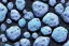 Placeholder: Blue raindrops on a white rock, lava, close up view, photo quality, stone marble, ultra realistic