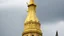 Placeholder: A light yellow spire with lightning designed in ancient Egyptian architectures and sculptures painted by Cai Jia