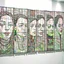 Placeholder: A Wide Panel in which 5-6 potraits are deveped with Wool threads tapestry artwork connected with each other through threads,