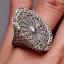 Placeholder: platinum art noveau ring, filigree, floral, breathtaking, highly ornate, delicate, intricate, photorealistic, high fashion, fine jewellery, luxury, designer