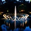 Placeholder: camera captures from above,Create a scene where 16 fountains in a small sea shoot water jets in the shape of a love symbol, creating beautiful splashes in the water.