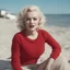 Placeholder: Childish marilyn monroe in a red woollen sweater, on the beach, in the sun