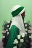 Placeholder: A man in the form of an imam turban does not show his face He wears a green robe A place surrounded by roses the place white