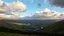 Placeholder: View across the valley in the Yorkshire Dales with beautiful clouds, late afternoon sunshine, stone walls enclosing the fields, gentle hills and valleys, river, calm, peaceful, tranquil, beautiful composition