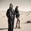 Placeholder: Female fashion models in the Gobi Desert.