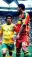 Placeholder: Maradona and Ronaldo Fenômeno Brasil . Use a high-resolution 16k camera with a 16:9 aspect ratio, a raw style, and a quality setting of 2. –ar 16:9 –v 5.2 –style raw –q 2 –s 750