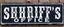 Placeholder: fill composition with large and wide historical hand painted old western sign that reads: "SHRIFFS OFFICE" white on black with inset white stripe boarder aged paint on wood sanserif