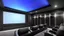 Placeholder: Generate an image of a sleek home cinema with our top-notch projectors and surround sound systems with a star-lined ceiling similar to a Rolls Royce in a high-rise penthouse