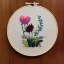 Placeholder: exquisite whimsical australian flowers in embroidery hoop, intricate, highly detailed, linen and wood backdrop