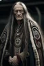 Placeholder: clean shaven old long haired warrior with tribal tattoos and cloak