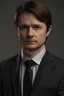 Placeholder: Einen Mann der ernst schaut in einem ANzug mit braunen haaren