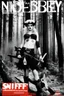 Placeholder: SNIFFIN’ GLUE magazine high res photo cover by Ralph Steadmann:, special Disobey issue, guest star: Nina Hagen in lumberjackwith a bloody axe in a forest surrounded by woods, NO RULES, just punk