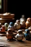 Placeholder: a collection of small cute bird figurines on a wooden surface