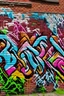 Placeholder: Graffiti on brick wall saying '' Graffiti og Streetart''