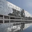 Placeholder: The museum's exterior facade is made of modern mirrors