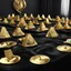 Placeholder: Close-up of a table with black velvet tablecloth with many Grammy Awards lined up side-by-side in perfect order, dramatic natural lighting, 3d Octane Render, photorealistic, hyperdetailed, shiny polished gold.