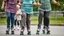 Placeholder: Elderly pensioners on roller skates. Head, shoulders, body, feet and skates are in the picture. Everyone is happy. Photographic quality and detail, award-winning image, beautiful composition. 28mm lens.