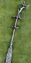 Placeholder: A large silver and Gold spear weapon covered in rose's and thorns, realistic, fantasy,