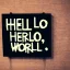 Placeholder: A sign that says 'Hello World'.