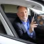 Placeholder: Jim Cramer inside Toyota Prius