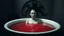 Placeholder: monochrome photo of very blur face pale woman sitting in bath tube around her red water, in bath, blur fog, background one black demonic shadow, dark gray old wall, darkness around, sad, surreal dark vibe, dark colors, in wall circle dark deep abyss,splash art, cinematic, depressive vibe