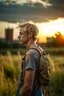 Placeholder: A profile photo of a handsome fifteen year old boy wearing an old backpack standing in a field with an abandoned city skyline in the background, short blond hair, ripped tank top and torn shorts, sunset, tall grass, bright colours, lonely landscape, cinematic photography, high resolution, high quality, highly detailed.