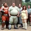 Placeholder: Oil 70's Pulp Real Photo Retro F Mat 45 Future Troop Wavy Short Long Nat pulled back hair pale morbid pajama shorts Enchant Armor Dwarf Strong stand couple hap grin smug rot front front eye huge a Nake M huge B Astro Neg Photo (size difference, age difference, group of thick chubby obese mature women, the other a petite toned smaller younger male:1.2)