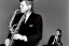 Placeholder: Lonely John f kennedy playing A normal saxophone with his eyes closed