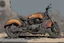 Placeholder: motorcycle, comic book,post-apocalypse, gray background,