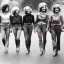 Placeholder: Four Ziegfeld Girls on jeans walking