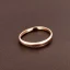 Placeholder: delicate thin ring with tiny diamond, stacked rings