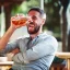 Placeholder: man enjoying a drink after a hard day's work