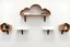 Placeholder: wall shelves made with brackets shaped like clouds