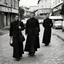 Placeholder: An odd city, Lutenblag, Molvania, East Europe 1990's, paradoxical, gente brutta, vestita male, sdentata
