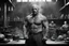 Placeholder: [very impressive high res masterpiece in Kodak Eastman 5247, scene by László Krasznahorkai] bald Charles Bronson as Vulcan covered with tattoos, the deity of hell and blacksmith of gods, in his smoky workshop, his hands are surrounded by an aura of power