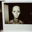 Placeholder: polaroid of a display mannequin with big wet eyes in an empty room, 1850
