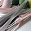 Placeholder: transparent nylon zips, elasticated ribbons, tulle voile and embroidered edges, dusty pink and milky metal gray colors woven trimmings