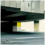 Placeholder: Minimal contemporary abstract oil paintings of desolate 1960s carpark with road markings and concrete fragments. Overlay with grungy typography graphics. style of Justin Mortimer and Francis Bacon.