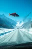 Placeholder: surreal mountain road seen through a dirty truck front window, dirty blue snow and wind, a red fish floating in the sky