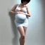 Placeholder: realistic photo of a 23-year-old beautiful tomboy, short men's hairstyle, short black hair, boyish face, beautiful women's cleavage, wide hips, big ass, pregnant in a satin lace dressing gown in a maternity ward