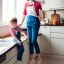 Placeholder: Realistic photo Russian shorthair beautiful tomboy boyish boylike young mother wide hips in kitchen