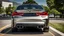 Placeholder: A luxurious (((fusion of a bmw and challenger))), its sleek contours and opulent details blending seamlessly together, rear view