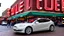 Placeholder: A Tesla's 'Model S Plaid' is doing donuts, at the 'Pike Place Market', in Seattle. CINEMATIC. WIDE ANGLE LENS. PHOTO REAL.