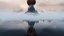 Placeholder: atop the tip top of a lonely mountain's peak, a big rocky clay planet is broken in half. The top of the mountain disappears into the sphere. foreground shrouded in mist. cinematic lighting, artstation, grim mood, looking up camera angle the background does not contain mountains