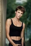 Placeholder: full color Portrait of 18-year-old prude Charlize Therone, with short, pixie-cut brown hair, tapered on the sides, wearing a black cotton sports bra and short - well-lit, UHD, 1080p, professional quality, 35mm photograph by Scott Kendall