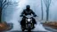 Placeholder: The photograph of a Knight Rider person dressed in a black motorcycle cloths riding a motorcycle through a foggy atmosphere. The rider's face is obscured by the fog, the scene with mystery mood. full body, blur background with fog, mystic, fantasy etheral mood