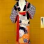 Placeholder: Retrato de cuerpo entero una Geisha con kimono con Katana con el estilo de Gustav Klimt