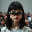 Placeholder: Female with straight dark hair and bangs with a full Vestigial synthetic mechanical face implant and ersatz multi-modal gadget facial appendages giving a speech, absurd psychology, metaphoric situational photography, minimalism, background is a TED talk symposium with crowd,